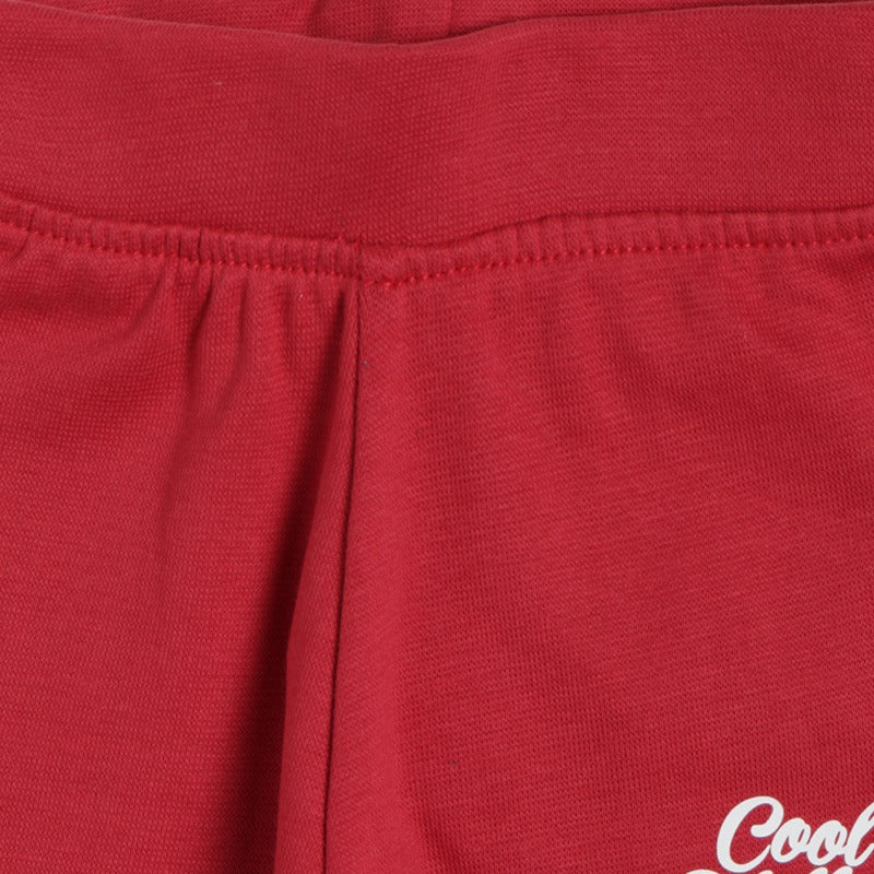 Close-up of red kids' innerwear waistband with soft fabric and elastic fit.