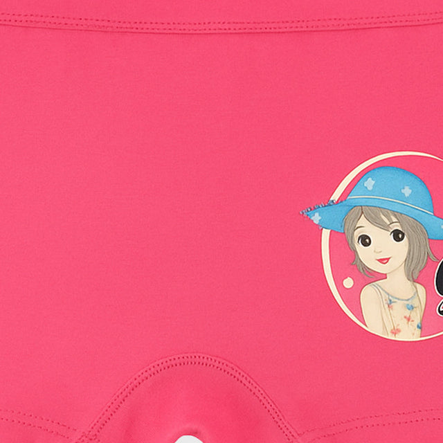 Pink girls' innerwear featuring a cute cartoon girl with a blue hat print, close-up view