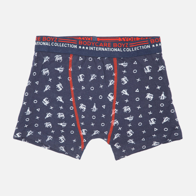 Navy blue boys' boxer briefs with white graphic print, red waistband, and contrast stitching