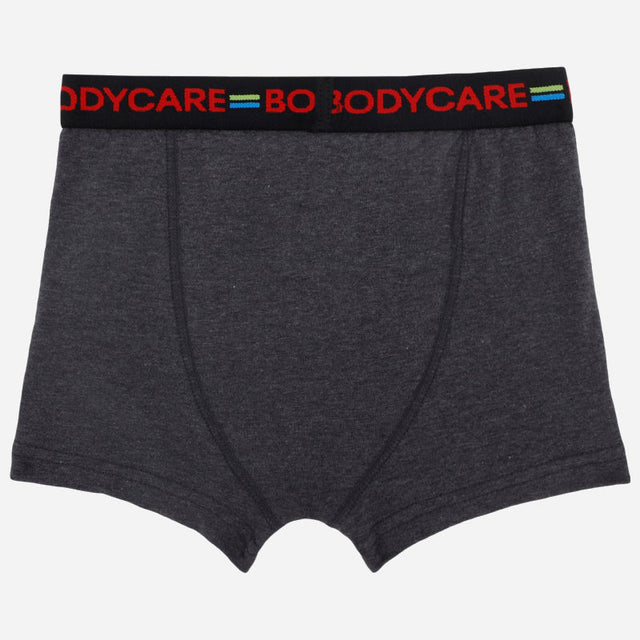 Boys dark grey boxer briefs with elastic waistband and red BODYCARE text, comfortable innerwear