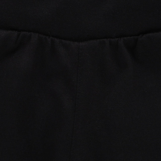 Close-up of black kids innerwear fabric with soft elastic waistband