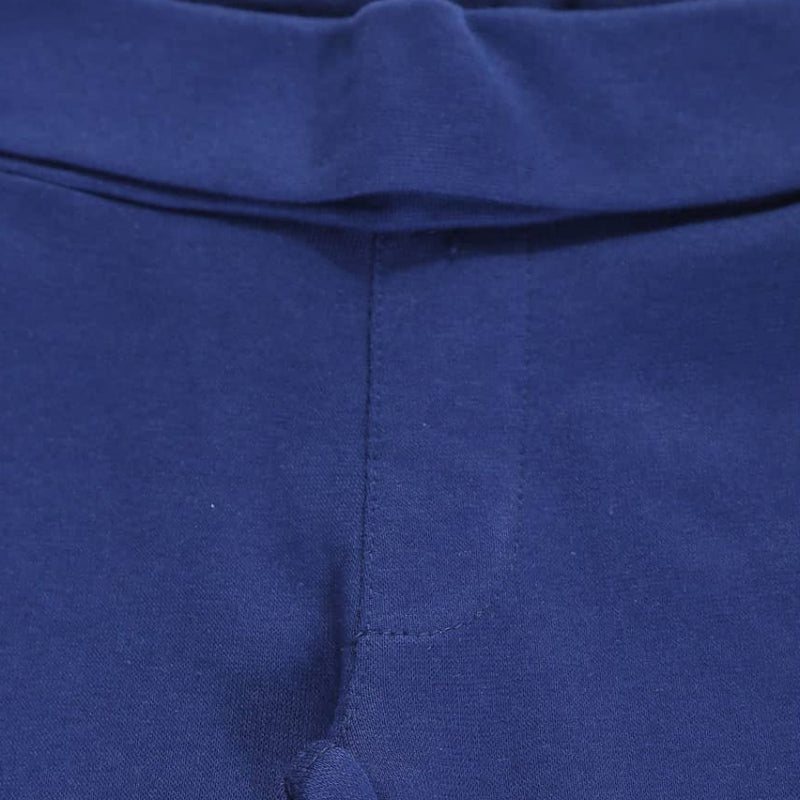 Close-up of blue kids thermal innerwear waistband and stitching detail