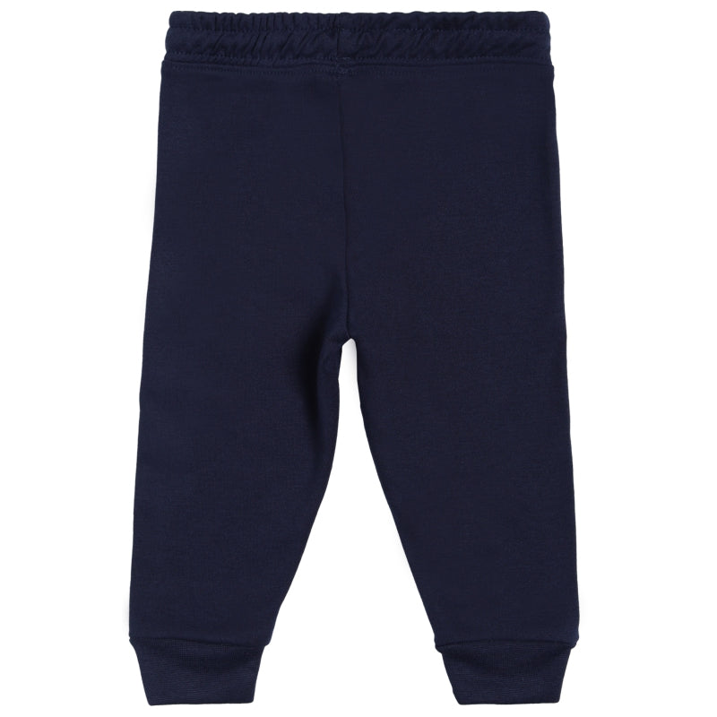 Navy blue kids thermal leggings with elastic waistband and cuffed ankles, back view