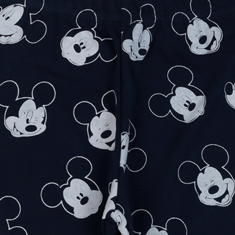 Navy blue kids innerwear with white cartoon face print, soft cotton fabric closeup