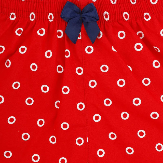 Red kids innerwear with white polka dots and navy blue bow, elastic waistband