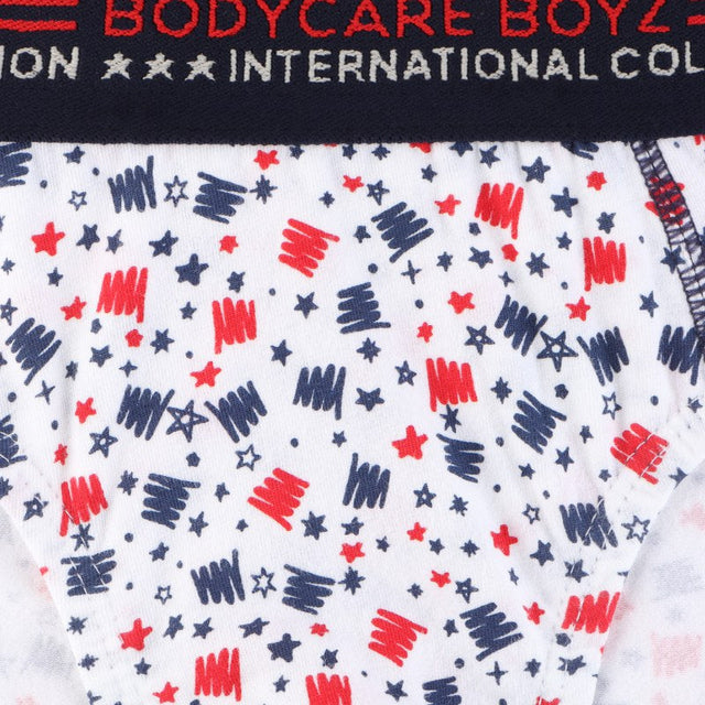 Boys' printed underwear with red and navy doodle and star pattern, elastic waistband visible