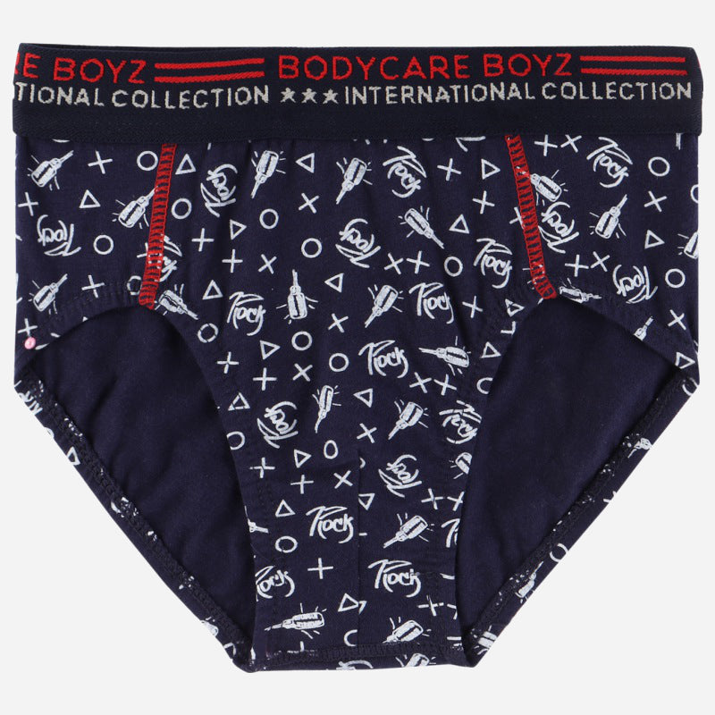 Navy blue boys' brief underwear with playful white rock-themed print and red waistband accents.