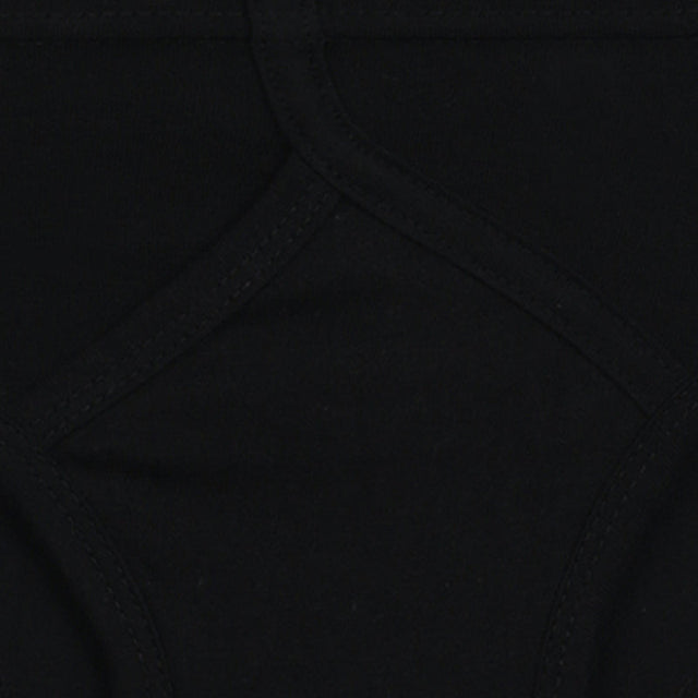 Close-up of black kids cotton innerwear with visible stitching and soft fabric texture