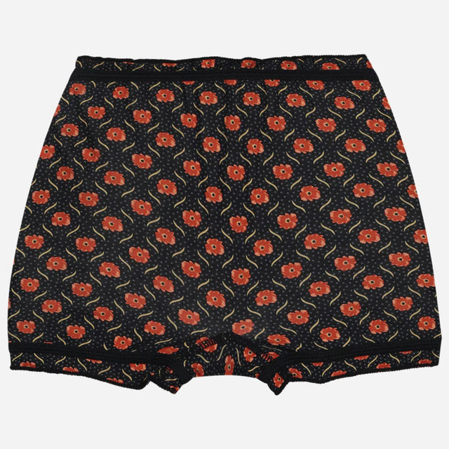 Girls' black floral printed shorts with red flowers and elastic waistband