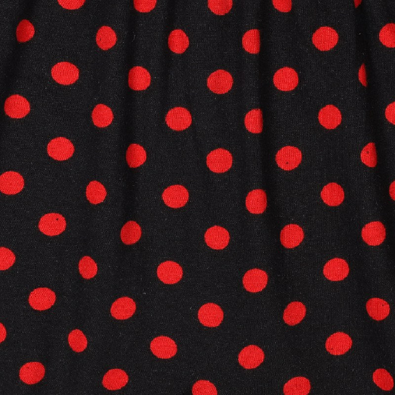 Black fabric with bright red polka dots, kids apparel textile pattern