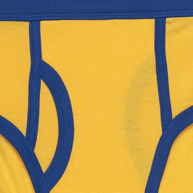 Yellow kids innerwear brief with blue waistband and trim, soft cotton fabric closeup