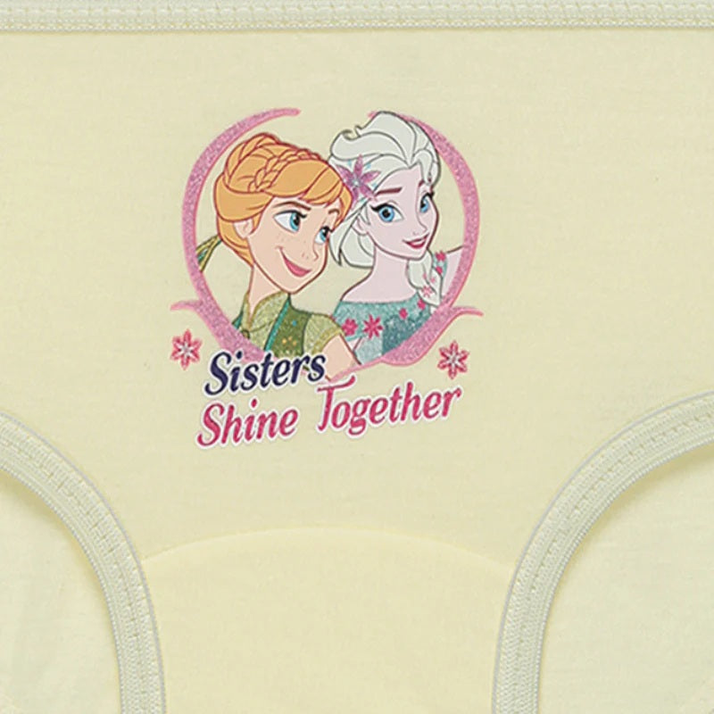 Girls' innerwear with cartoon sisters and 'Sisters Shine Together' text on soft yellow fabric