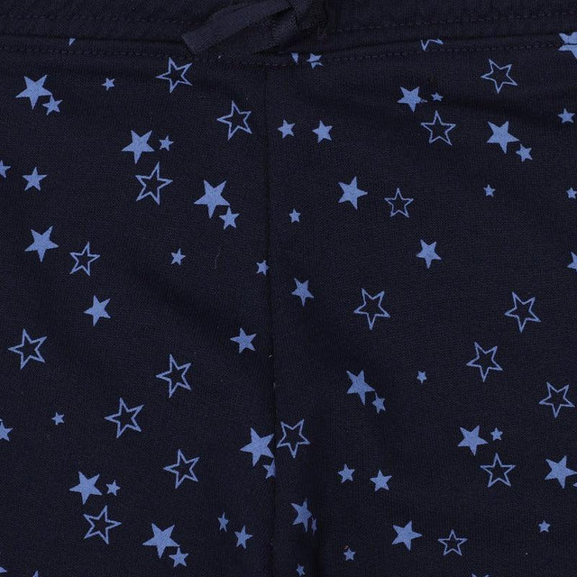 navy blue kids apparel with light blue star print pattern, soft fabric closeup