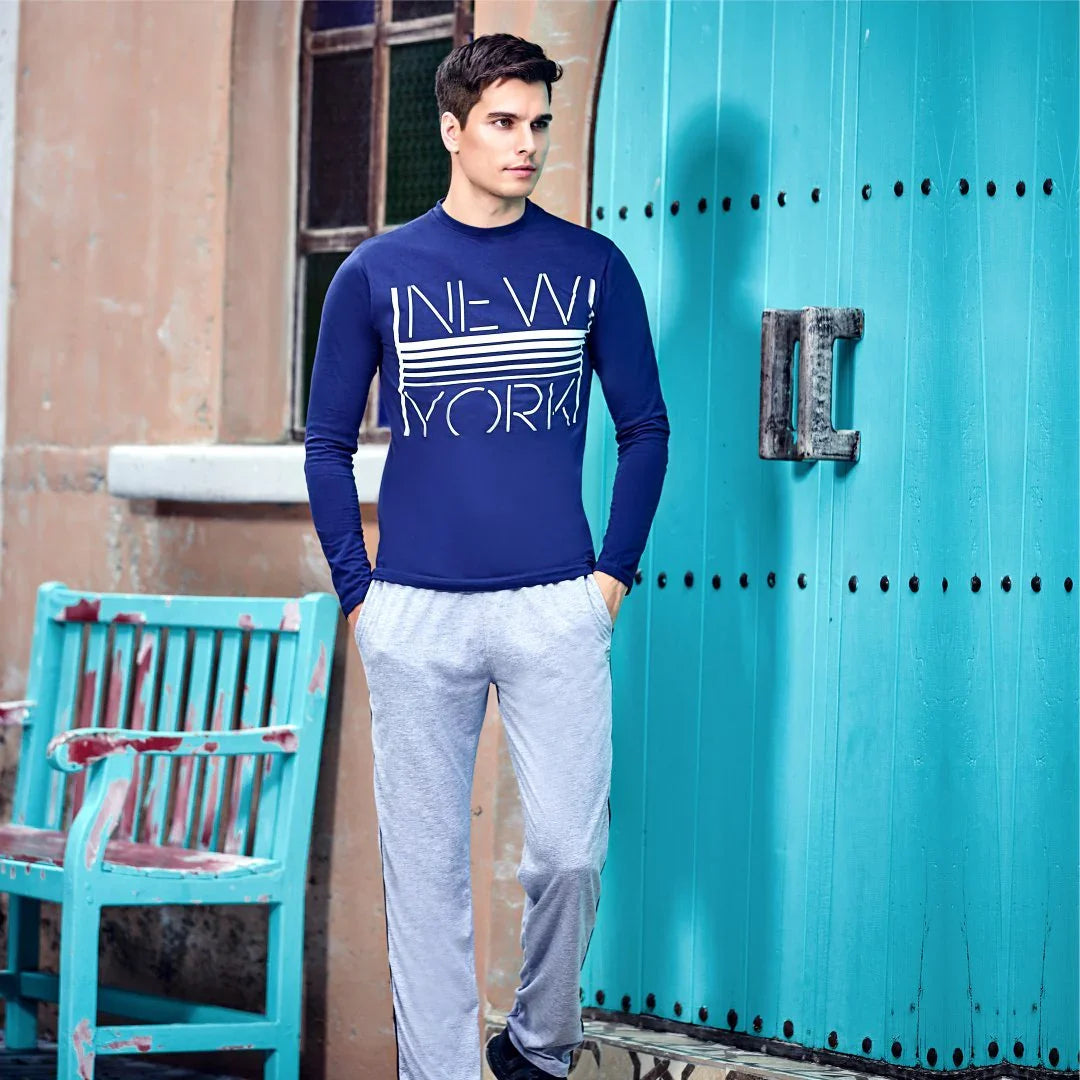 Man wearing casual long-sleeve t-shirt and joggers, showcasing fit and style for everyday menswear