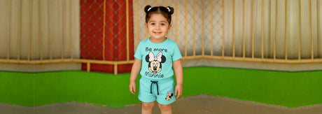 Toddler wearing Disney Minnie Mouse kidswear set, showcasing playful and stylish everyday clothing