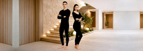 Elderly man and woman wearing full-sleeve thermal wear indoors for winter warmth and comfort