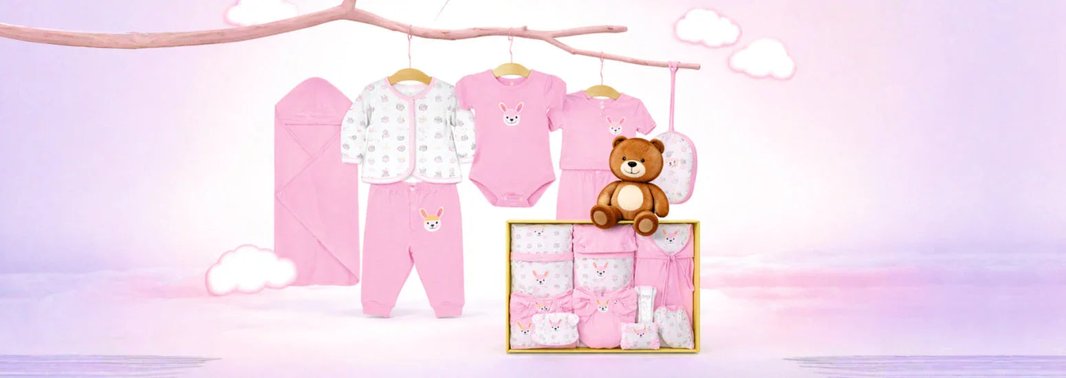 Baby gift set with newborn clothing essentials and soft toys, ideal gifting options for babies and toddlers