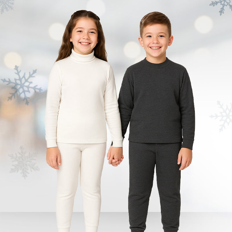 Kids wearing Bodycare thermals – warm soft, and skin-friendly winter wear for children.