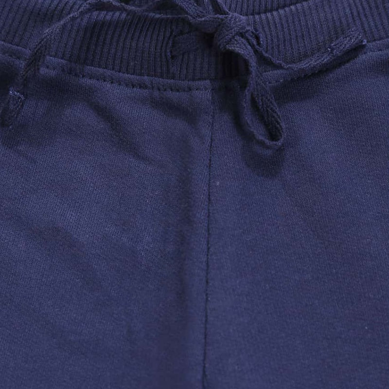 Close-up of kids navy blue jogger pants with drawstring and ribbed waistband