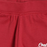 Close-up of red kids' innerwear waistband with soft fabric and elastic fit.