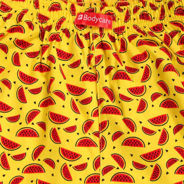 Yellow kids boxer shorts with red watermelon print and elastic waistband