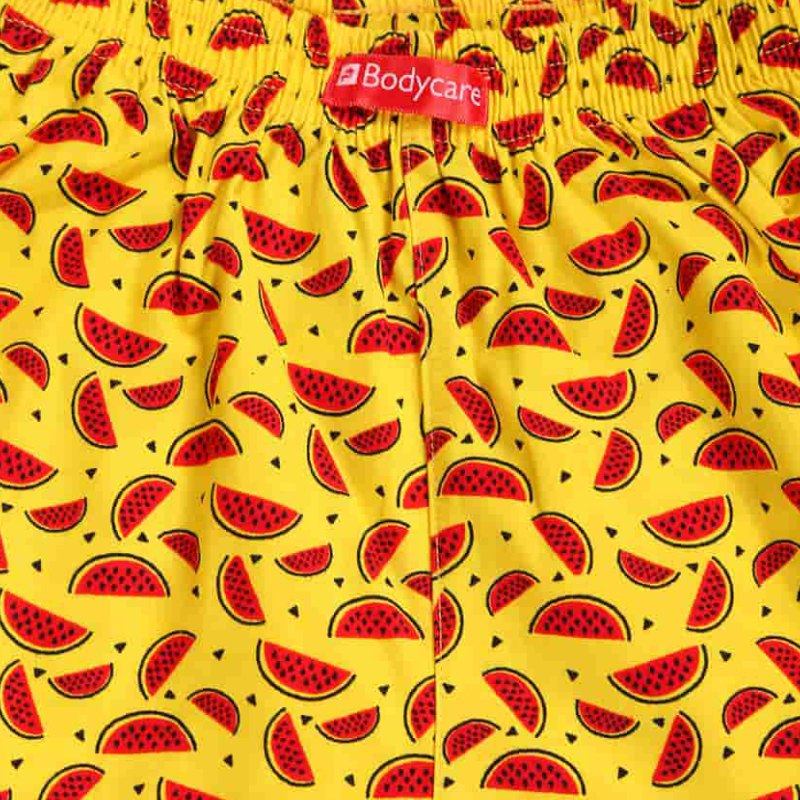 Yellow kids boxer shorts with red watermelon print and elastic waistband