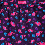 Close-up of kids' innerwear with purple fabric, pink and blue cartoon fish, elastic waistband