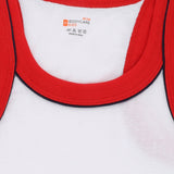 Kids white cotton vest with red trim, close-up of neckline and soft fabric