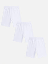 Set of three white kids cotton innerwear shorts with elastic waistband on white background