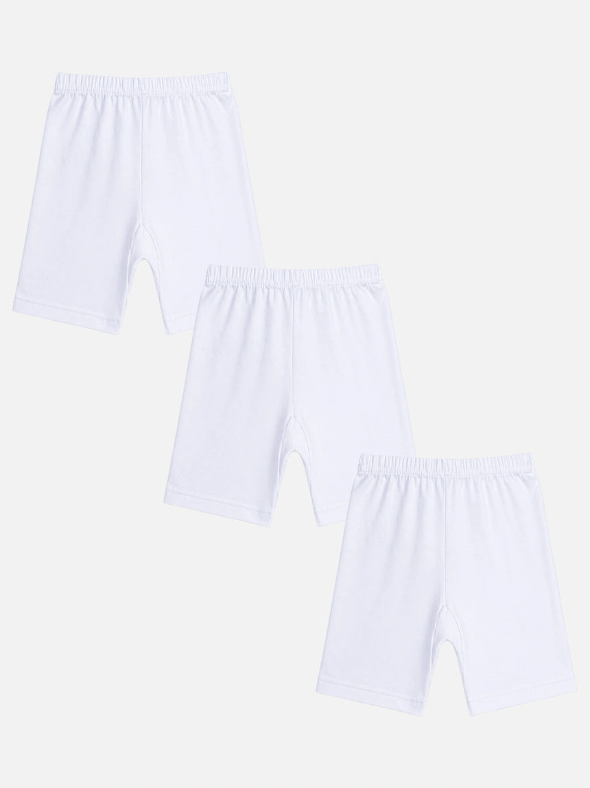 Set of three white kids cotton innerwear shorts with elastic waistband on white background