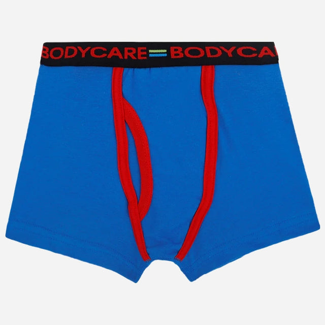 Blue kids boxer briefs with red trim and black waistband featuring bold text