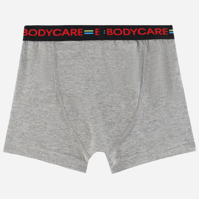 Grey boys' boxer brief with black elastic waistband and red BODYCARE text, kids innerwear.