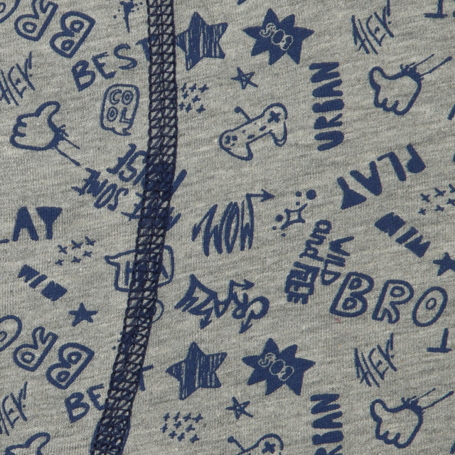 Closeup of grey kids innerwear fabric with playful navy blue doodles and stitched seam
