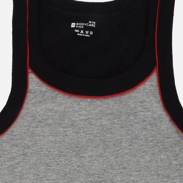 Kids grey sleeveless thermal vest with black and red trim, close-up of neckline.