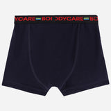 Navy blue kids boxer brief with black elastic waistband and colorful logo text