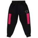 Black kids joggers with pink side panels and rhinestone heart accent, front view