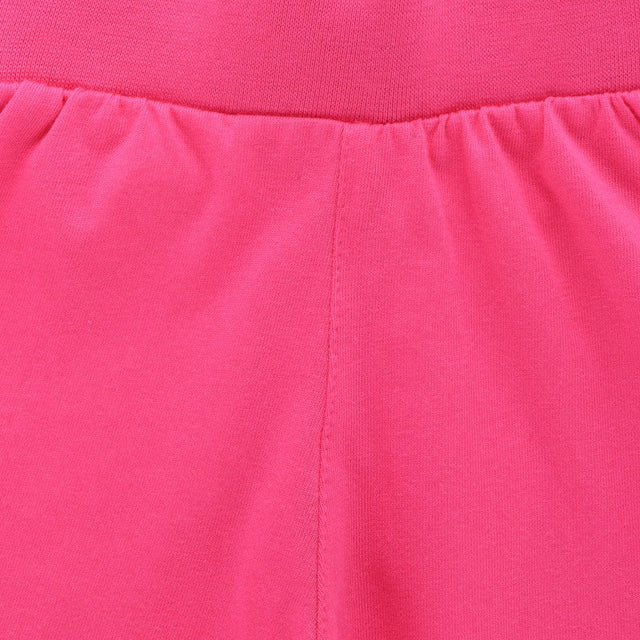 Close-up of pink kids innerwear fabric with elastic waistband and soft stitching
