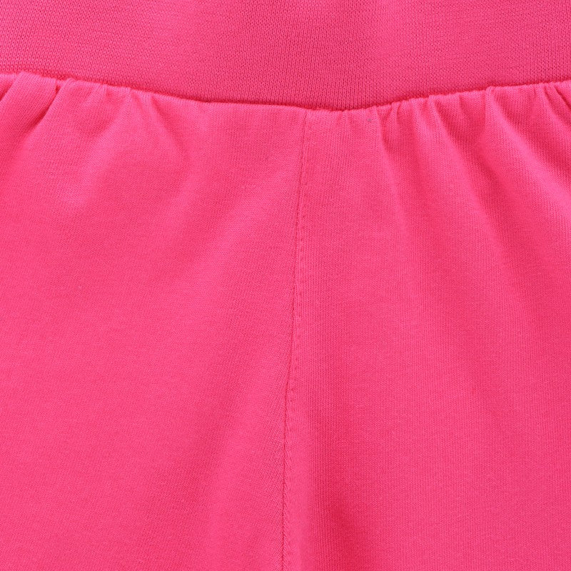 Close-up of pink kids innerwear fabric with elastic waistband and soft stitching