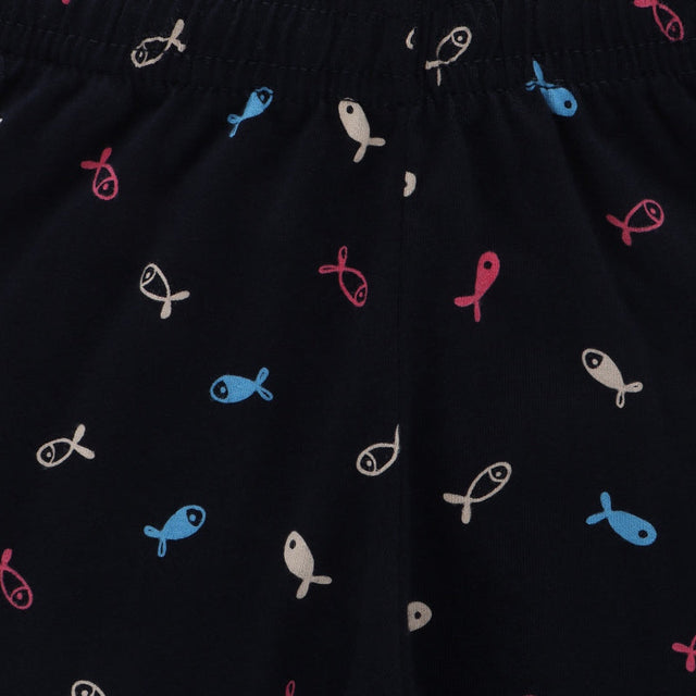 Close-up of kids' navy innerwear with blue, pink, and white fish pattern