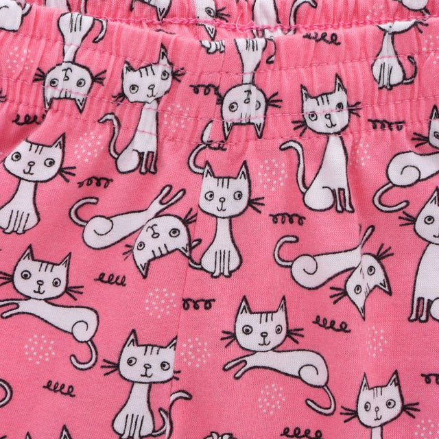 Pink kids innerwear fabric with white cartoon cat print and elastic waistband
