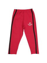 Red kids leggings with black side stripes and white chic & trendy text on the hip
