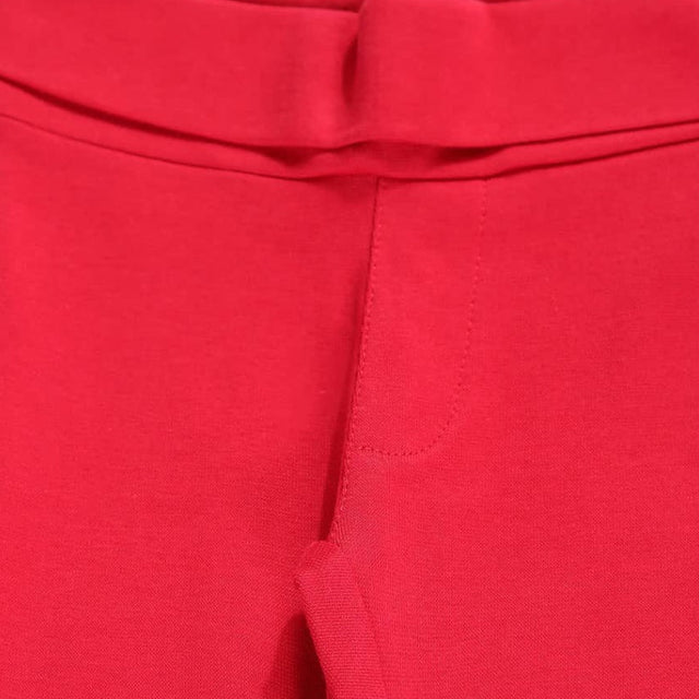 Close-up of red kids' thermal innerwear waistband and stitching detail