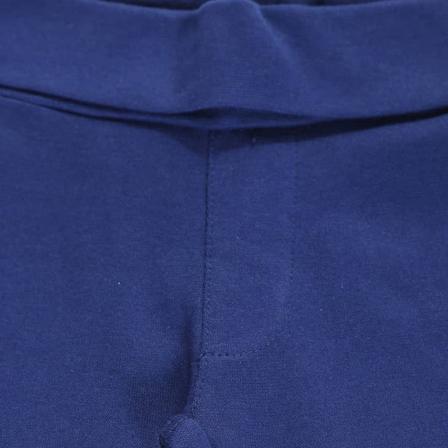 Close-up of blue kids thermal innerwear waistband and stitching detail