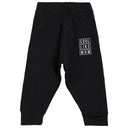 Black kids leggings with 'Cool Like Mom' white text print on left thigh, comfortable fit