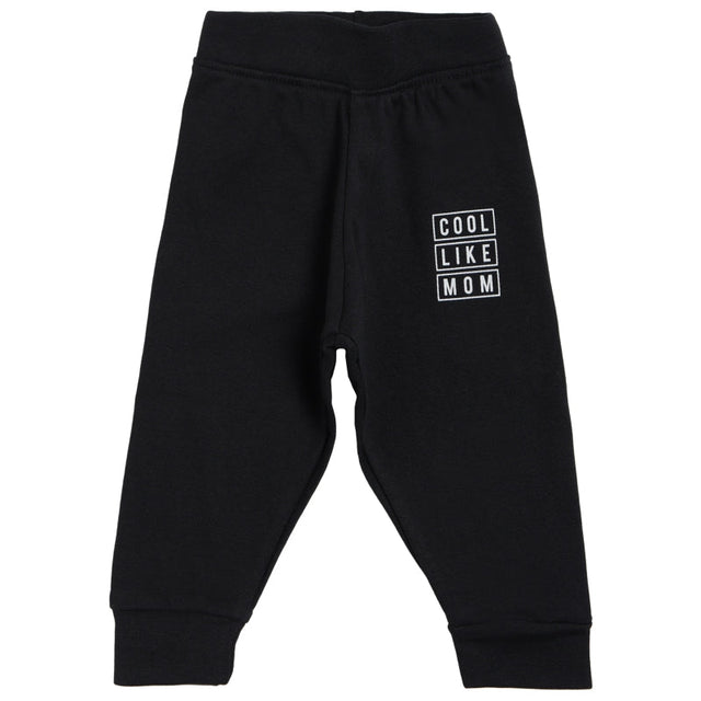 Black kids leggings with 'Cool Like Mom' white text print on left thigh, comfortable fit