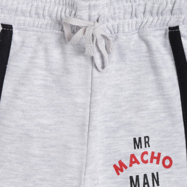 Light grey kids' joggers with drawstring waist and 'MR MACHO MAN' text print