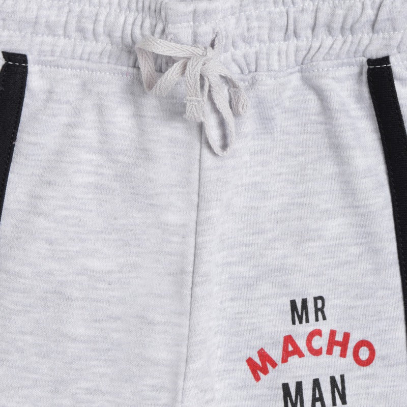 Light grey kids' joggers with drawstring waist and 'MR MACHO MAN' text print