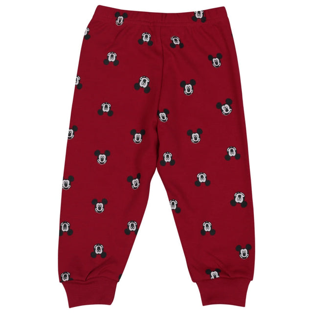 Red kids' pajama pants with playful cartoon face print and elastic waistband