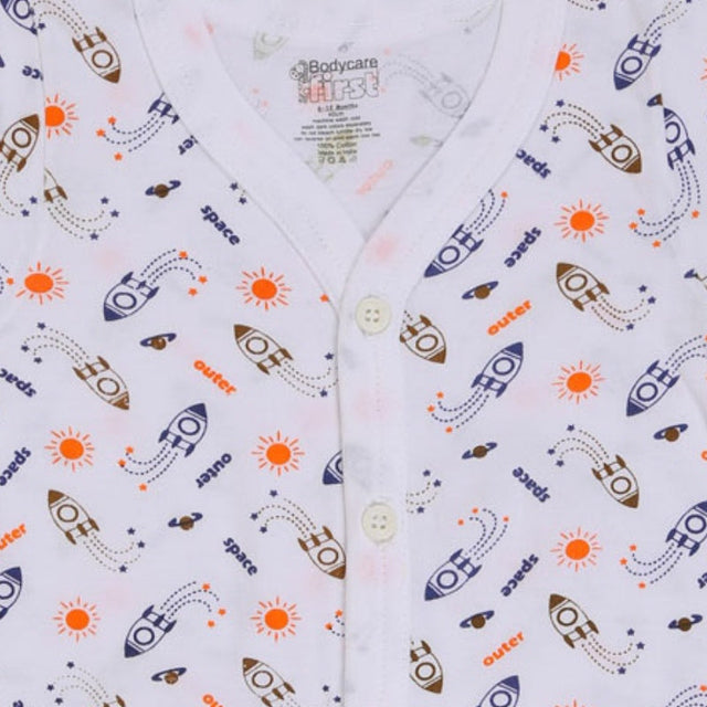 White kids' buttoned innerwear with colorful rocket, sun, and space print pattern