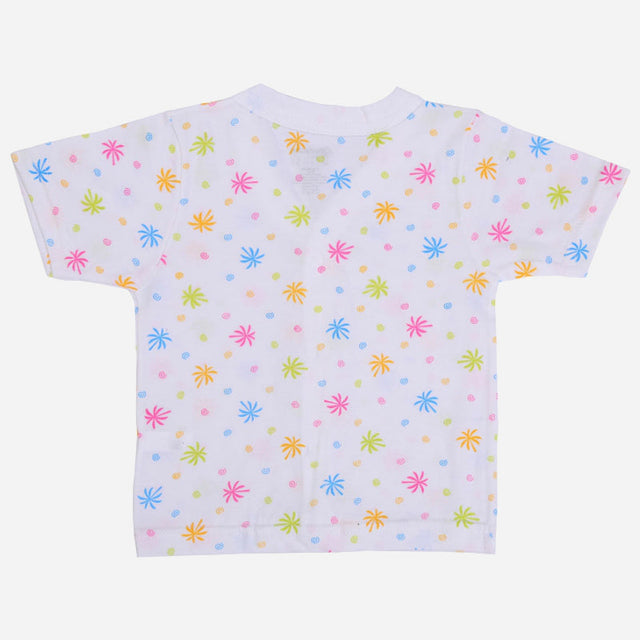 White kids t-shirt with colorful starburst and dot pattern, short sleeves, soft cotton